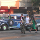 A jeepney with Mercedes hubcaps and a logo above the windshield. I wonder if it comes with a Mercedes engine as well. An AMG perhaps?